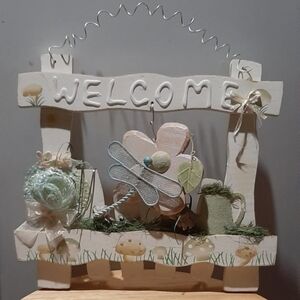 spring themed hanging welcome sign